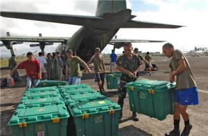 Volunteers transporting Shelterboxes in the Philippines - our club is a supporter of this charity